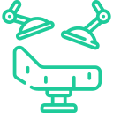 Icon depicting a green outline of an operating room. It features a surgical table and two overhead surgical lights, ideal for a veterinarian setting.